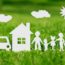 Paper Cut Of Family With House And Car On Green Grass